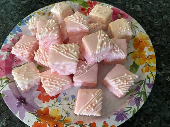 simple cake mix petit fours in pale pink with drizzle and edible pearls