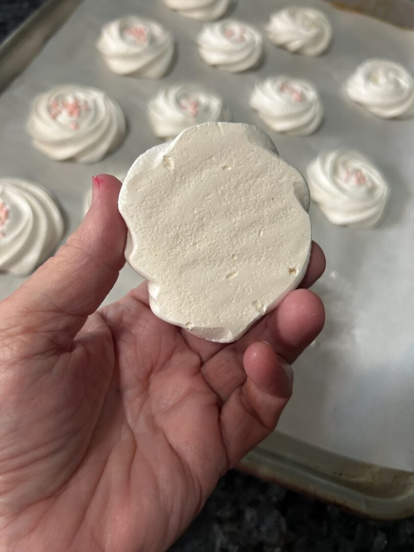 meringue rosettes cooled and ready to eat