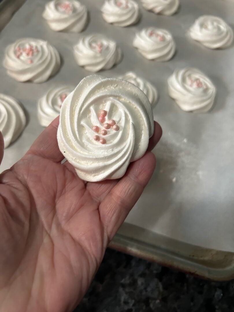 meringue rosettes cooled and ready to eat