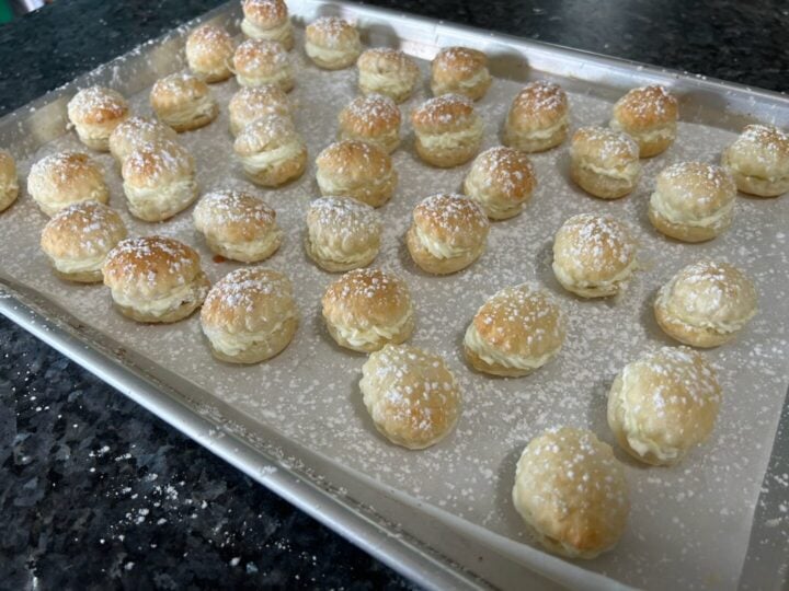 mini cream puffs sprinkled with powdered sugar