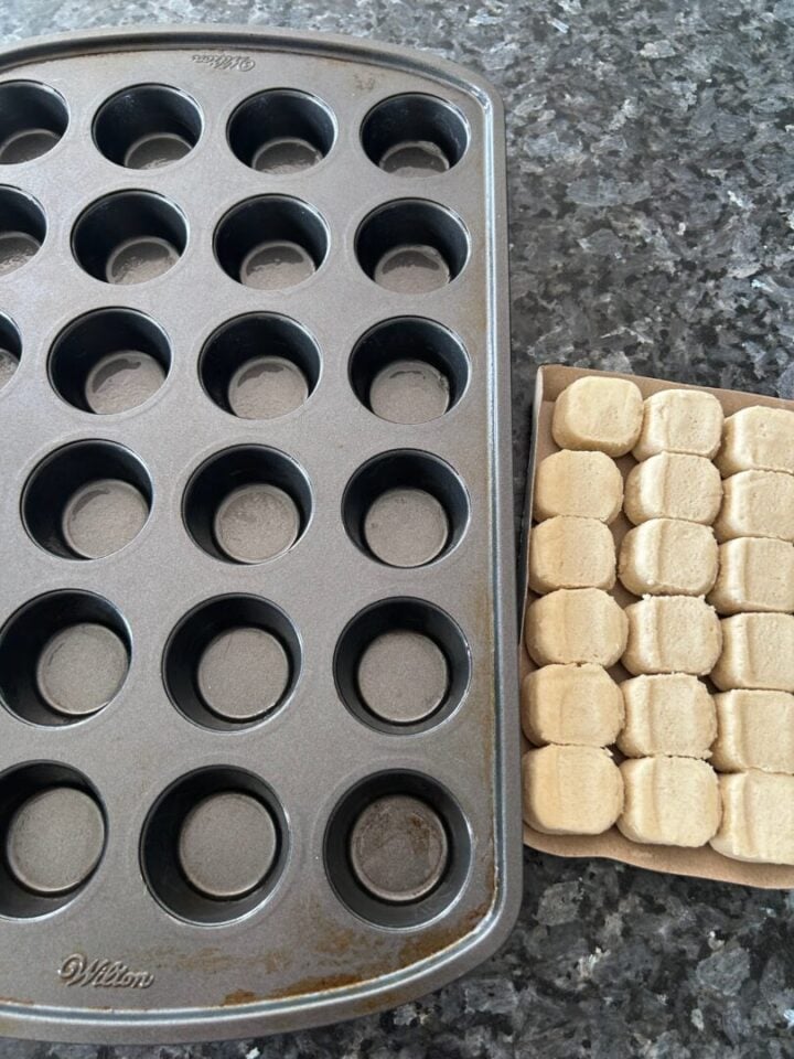 sugar cookie cough next to muffin tin
