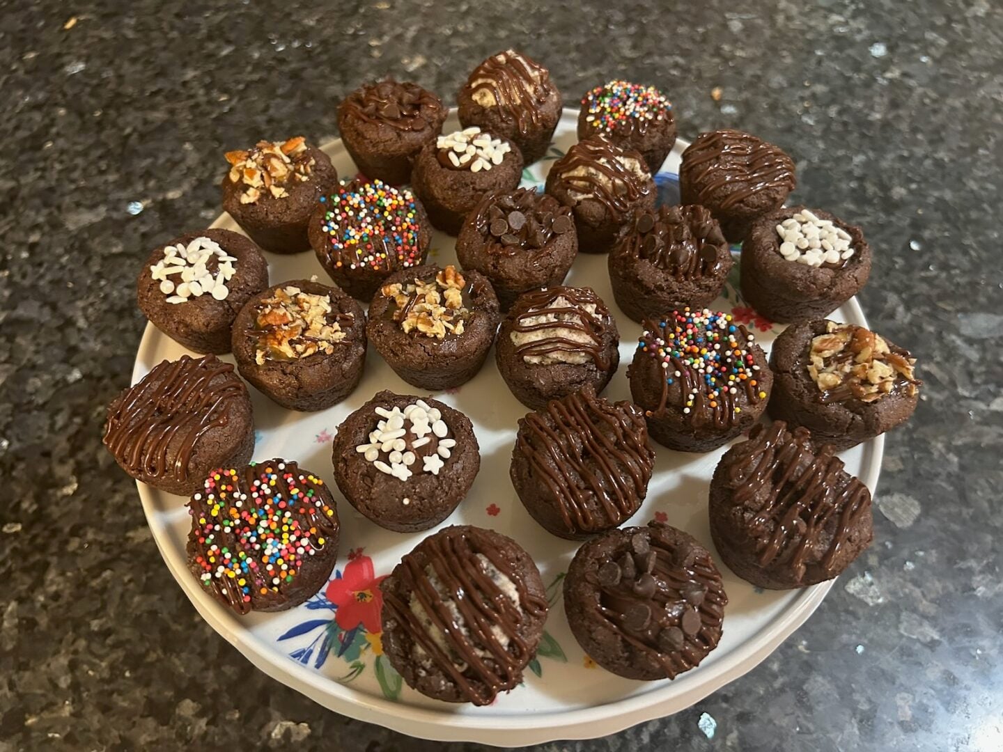 Brownie Bites with Chocolate Truffle Filling decorated in a variety of ways
