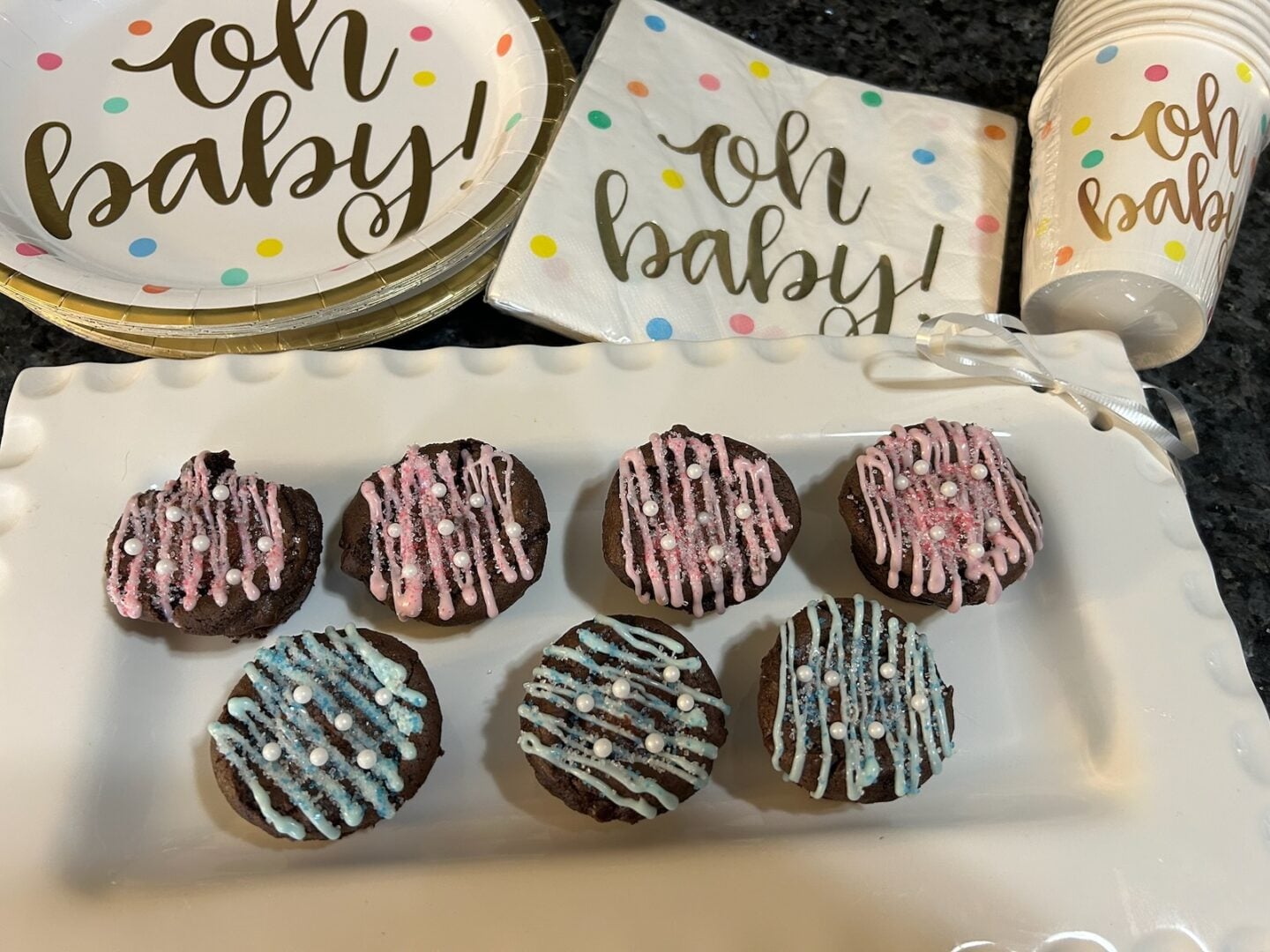 Brownie Bites with Chocolate Truffle Filling decorated for baby shower