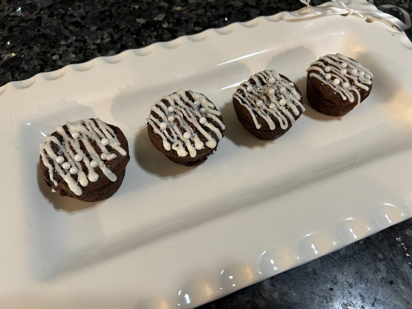 Brownie Bites with Chocolate Truffle Filling decorated for wedding