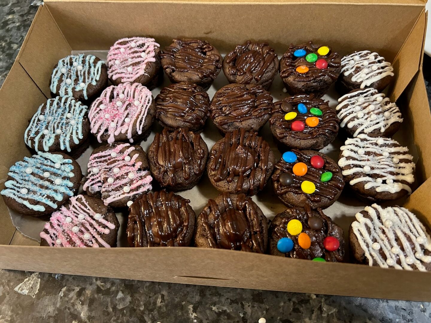Brownie Bites with Chocolate Truffle Filling in bakery box