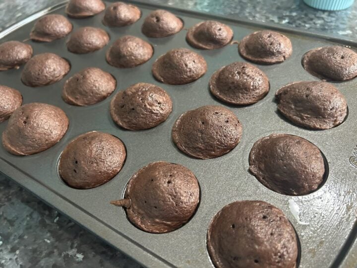 hot cocoa mini cakes in muffin tin