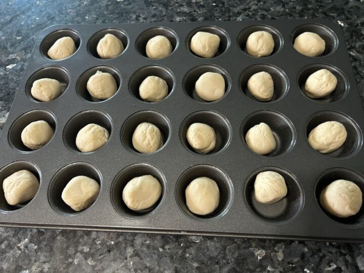 Lemon Shortbread Cookie dough in muffin tin
