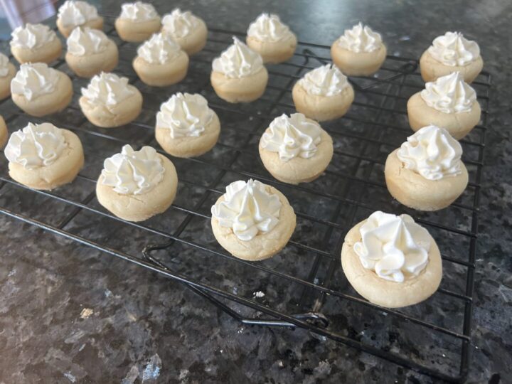 filled cookie cups on wire rack 