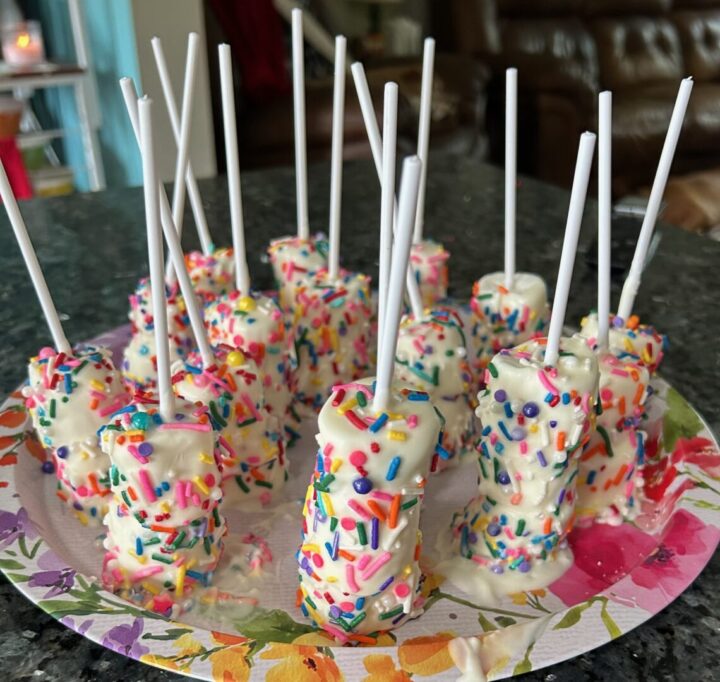 chocolate covered marshmallow pops with sprinkles