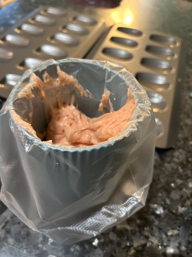 Madeleine batter in bag