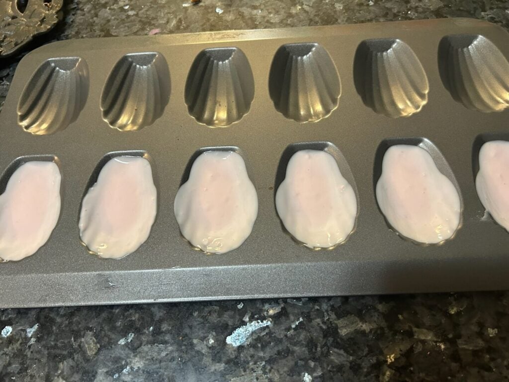 melted chocolate on Madeleine pan