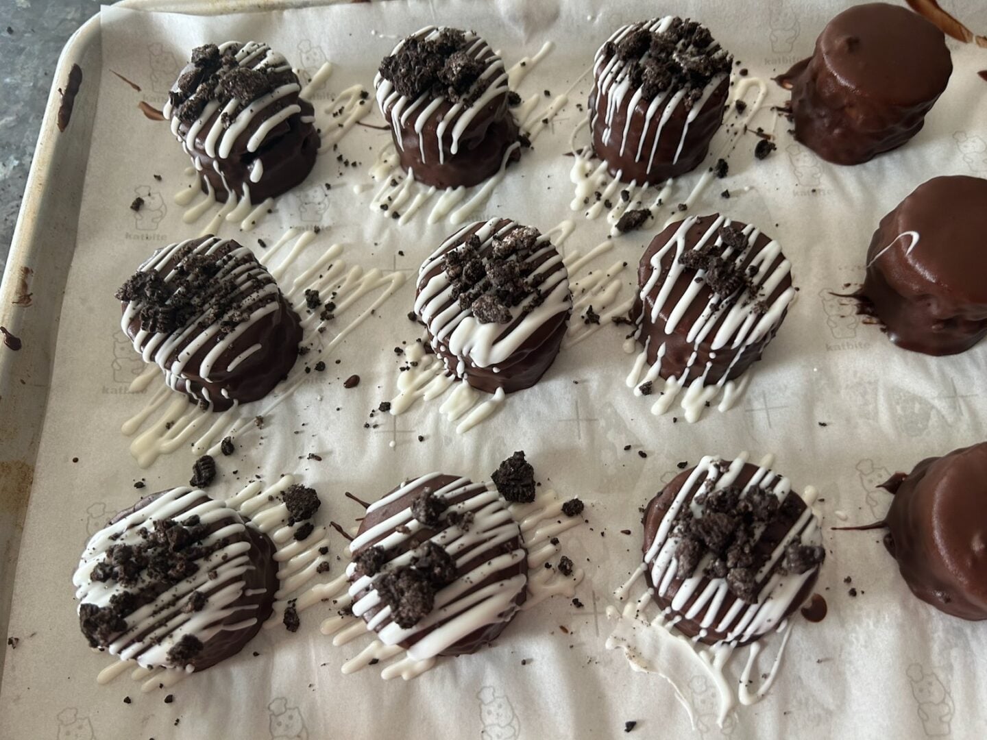 decorated petit fours with oreo crumble on top