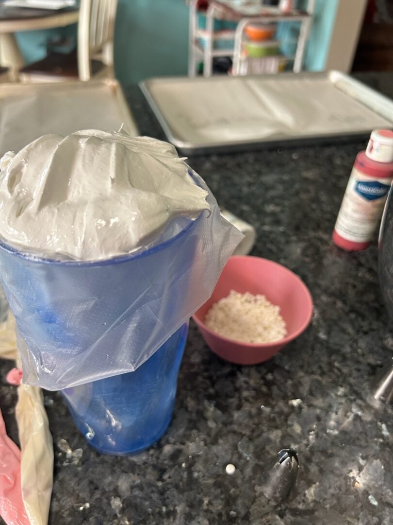 meringue batter in piping bag