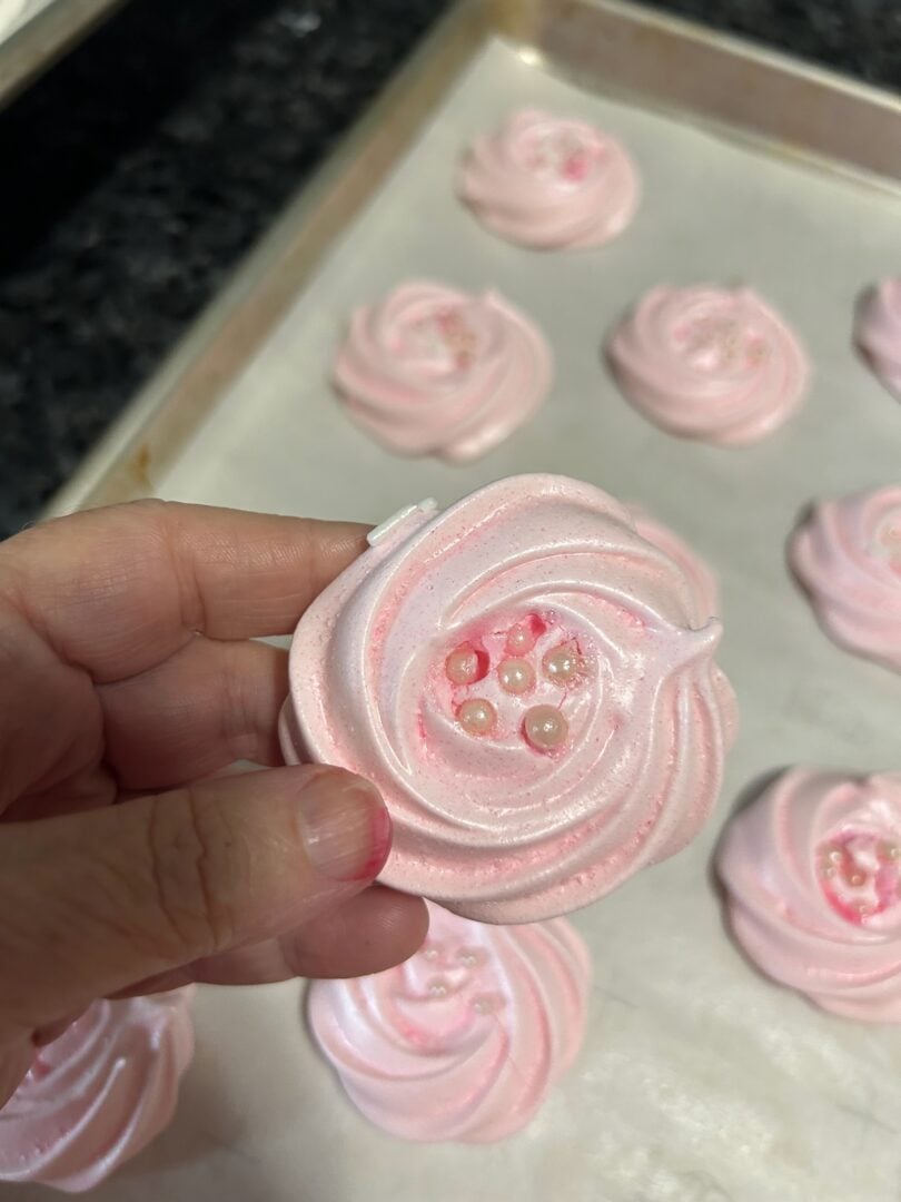 meringue rosettes cooled and ready to eat