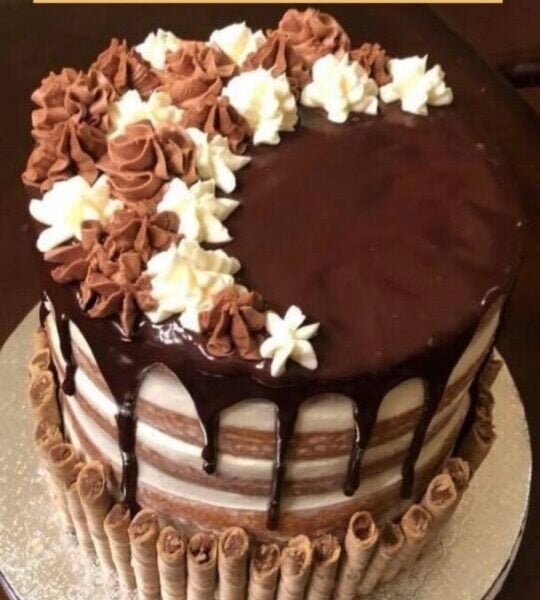 chocolate ganache cake drip on chocolate cake
