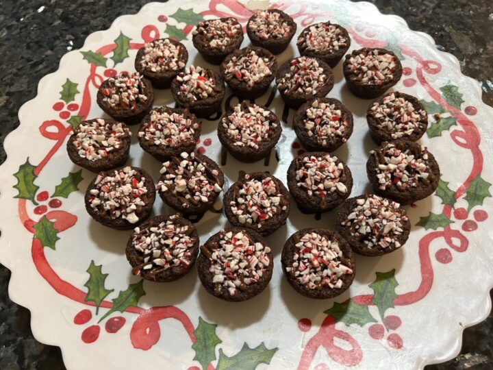 Mint Chocolate Cookie Cups with peppermint chips on serving tray