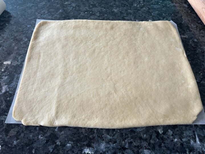 cinnamon roll dough rolled out