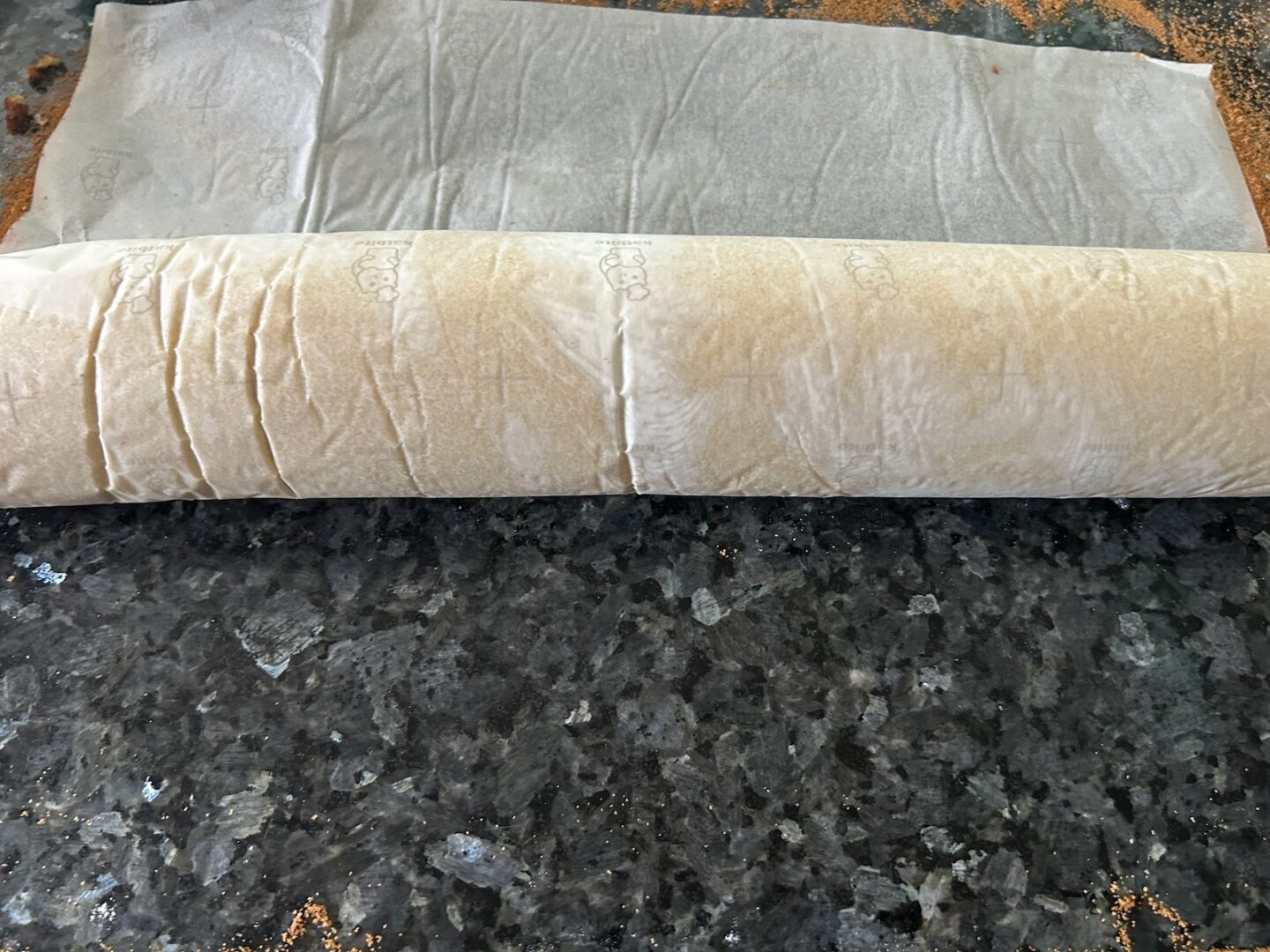 rolling the cinnamon rolls
