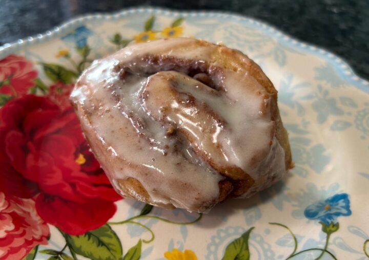 glazed cinnamon roll on plate