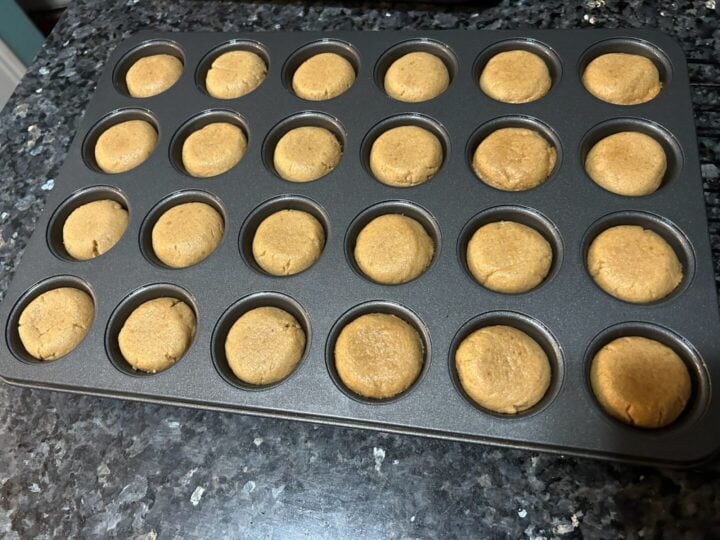 peanut butter cookies in muffin tin