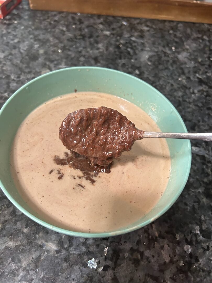 making chocolate ganache (chips and cream in bowl)