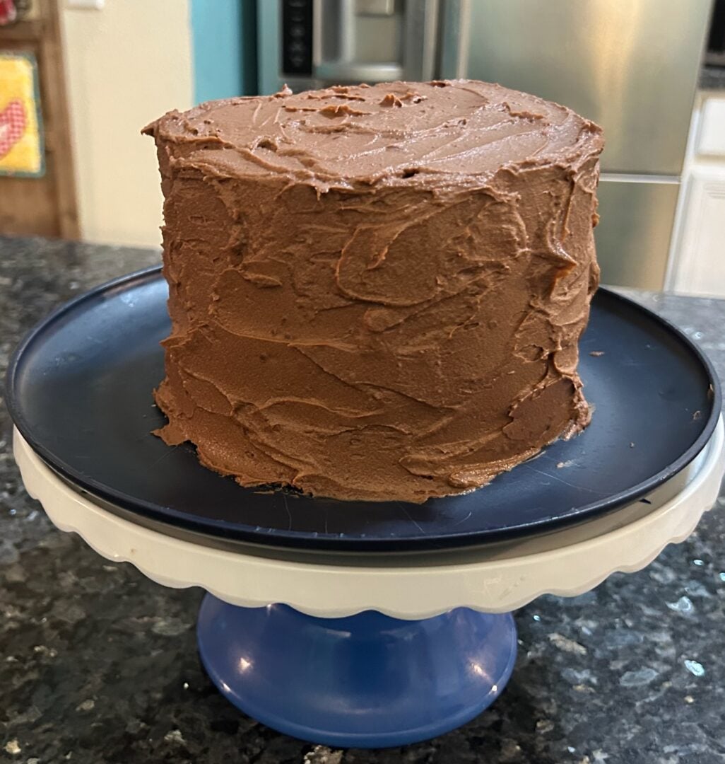 cake frosted with whipped chocolate ganache frosting