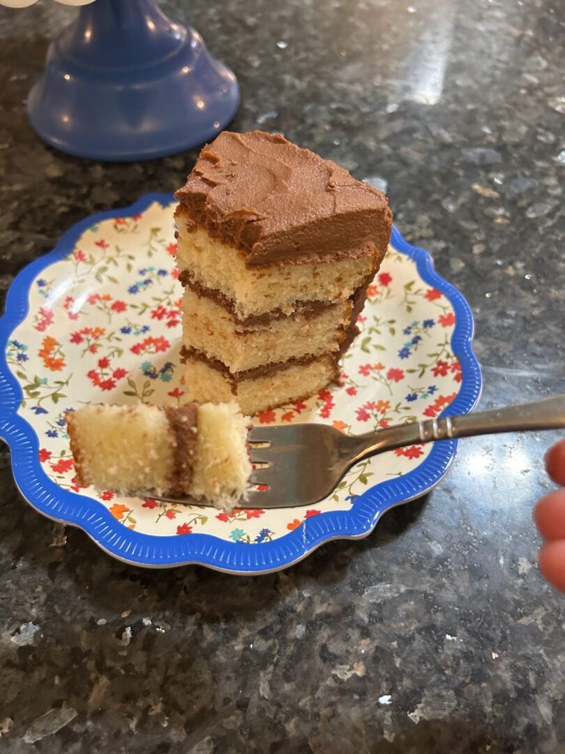 whipped chocolate ganache frosting on white layer cake