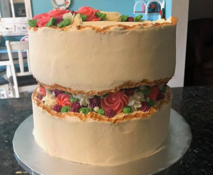 beautiful fault line birthday cake with rosettes
