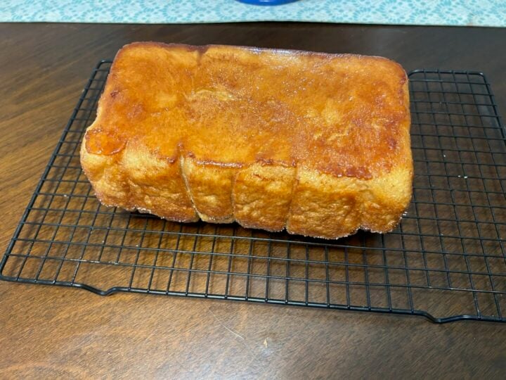 Easy Copycat Dollywood Cinnamon Bread upside down on wire rack, cooling