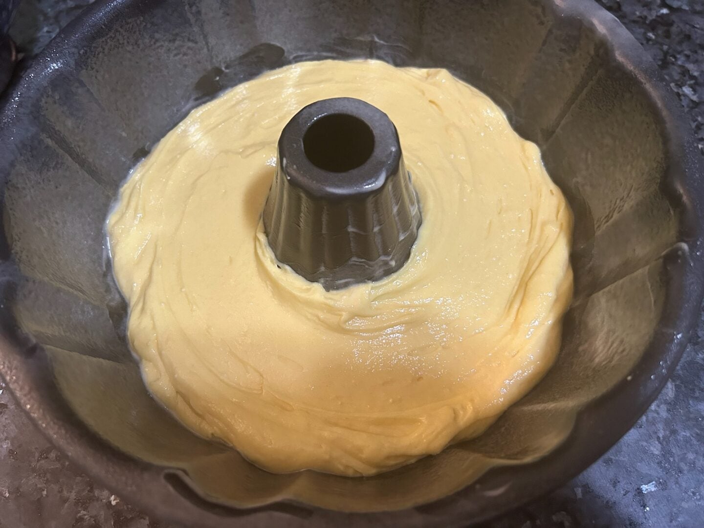 snickerdoodle cake batter in pan