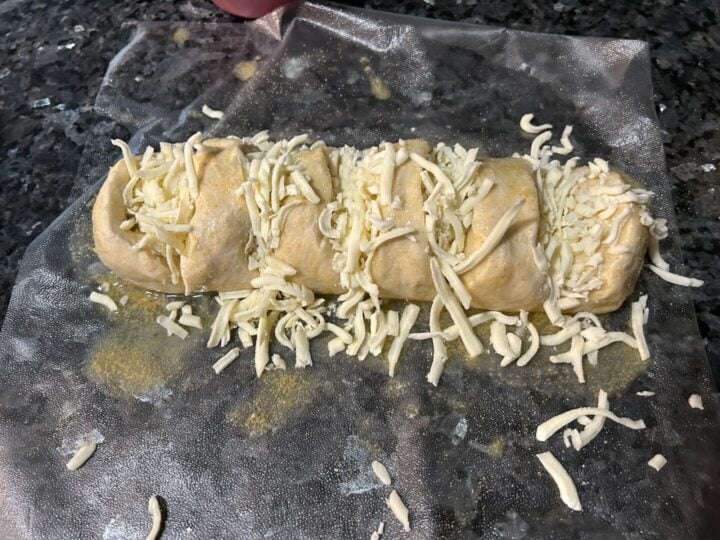 dough loaf with garlic, butter, and cheese