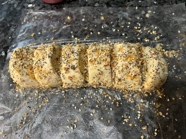 add everything bagel to buttered bread dough