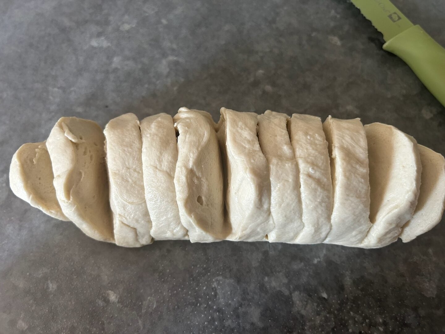 cutting bread dough