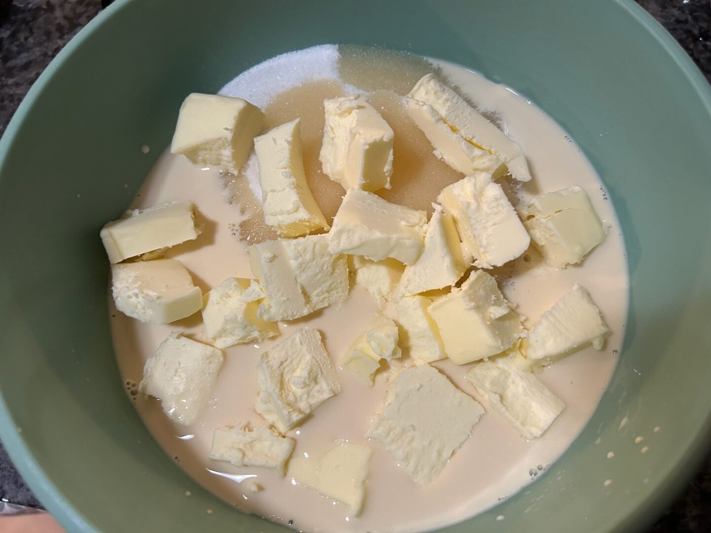 sugar, butter, and milk in bowl