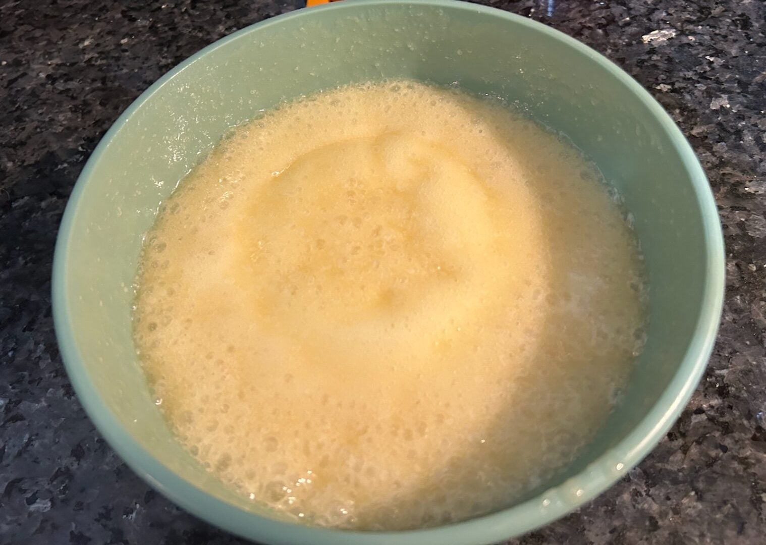 sugar, butter, and milk in bowl, boiling