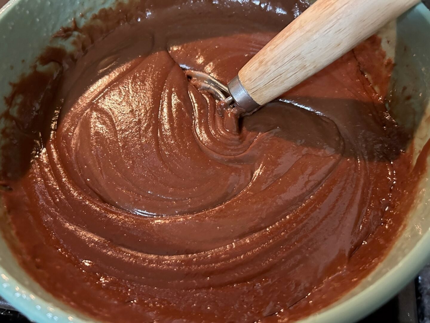 fudge in bowl being mixed