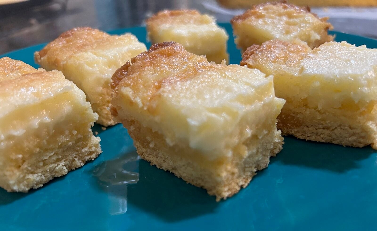 Lemon gooey butter cake sliced
