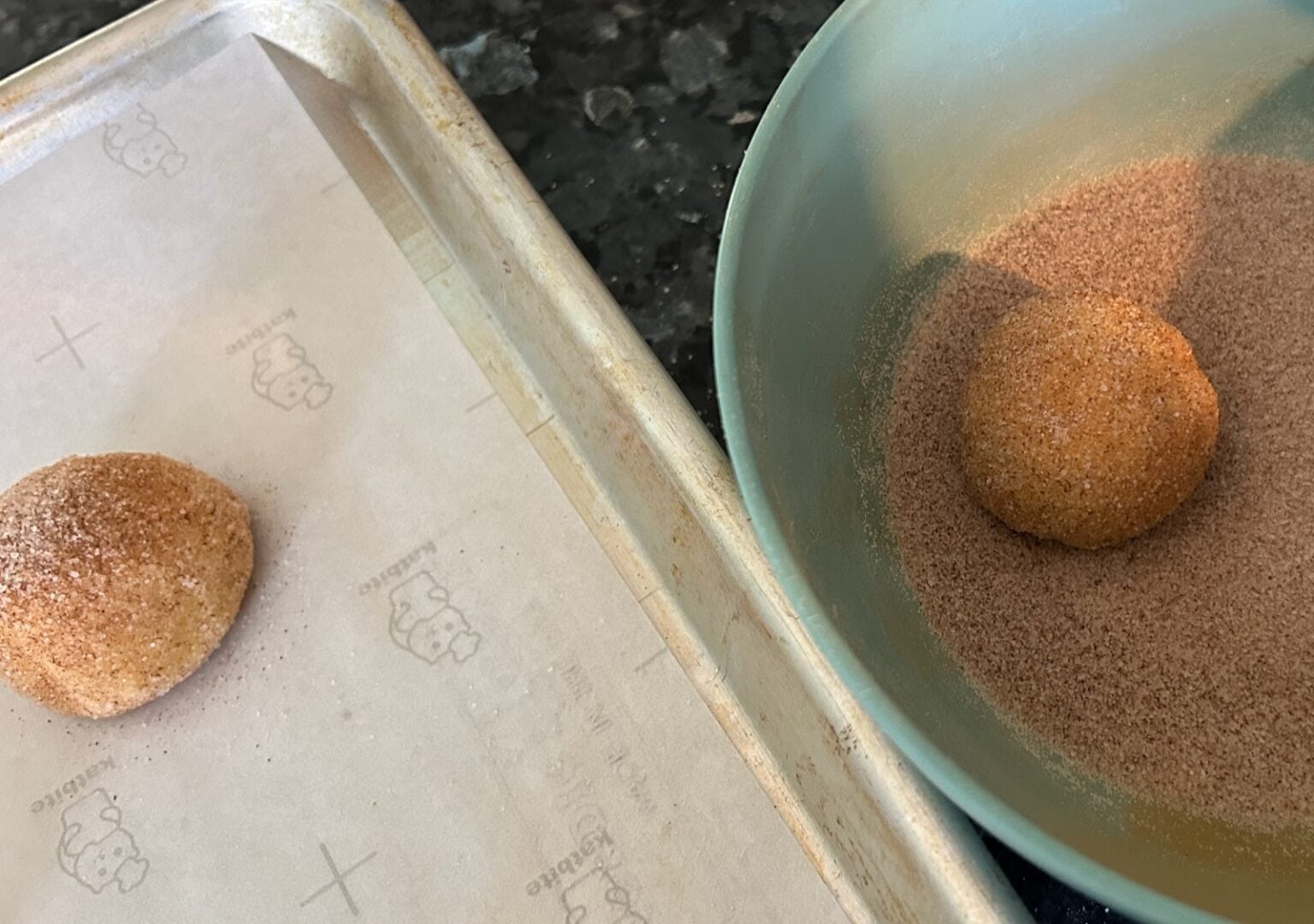 Easy Cake Mix Snickerdoodle dough rolled in cinnamon sugar